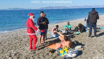 Ρόδος: Αντί για χιόνια ο Άγιος Βασίλης βρήκε… λουόμενους στην παραλία… (video)